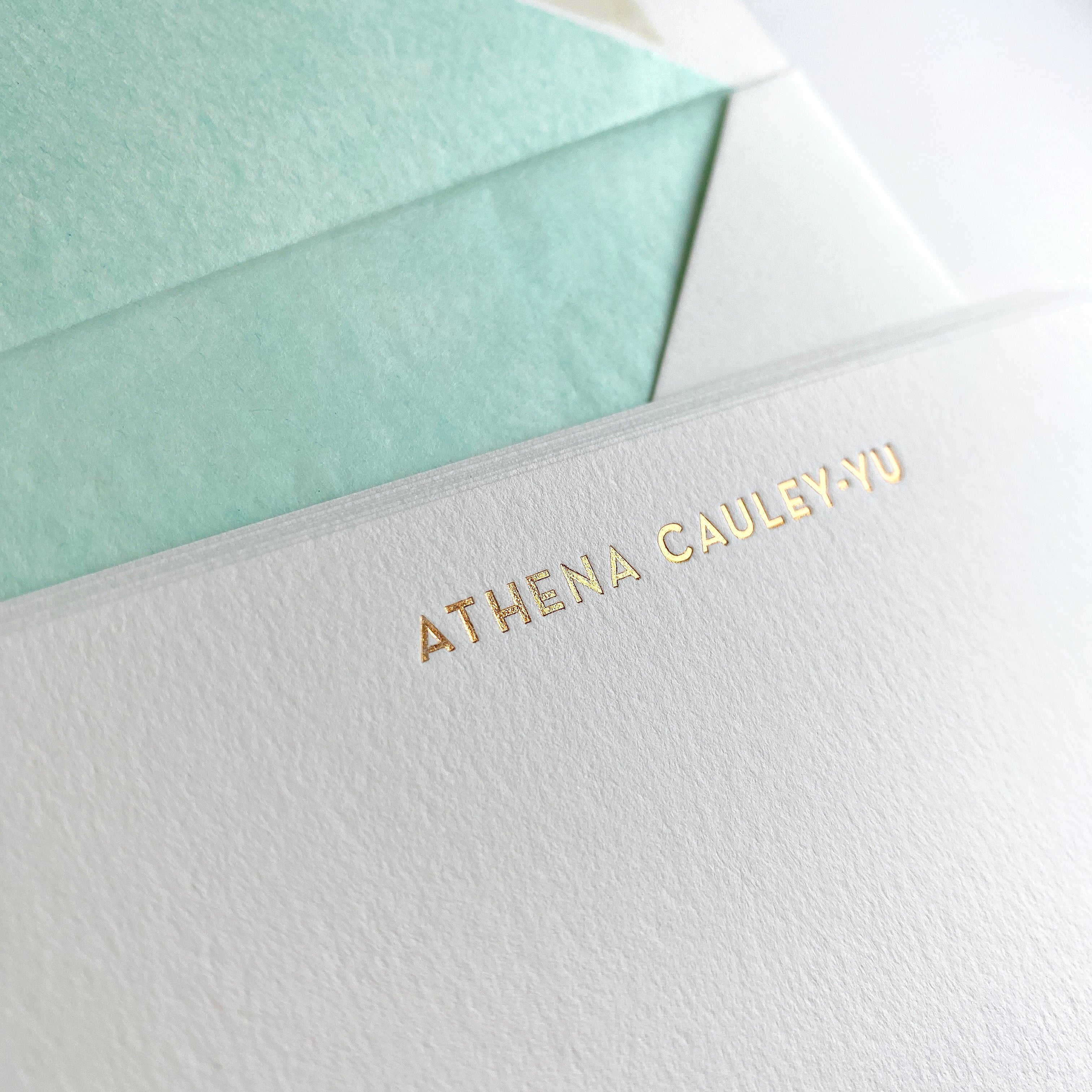 close up of shiny foil on personalised correspondence cards