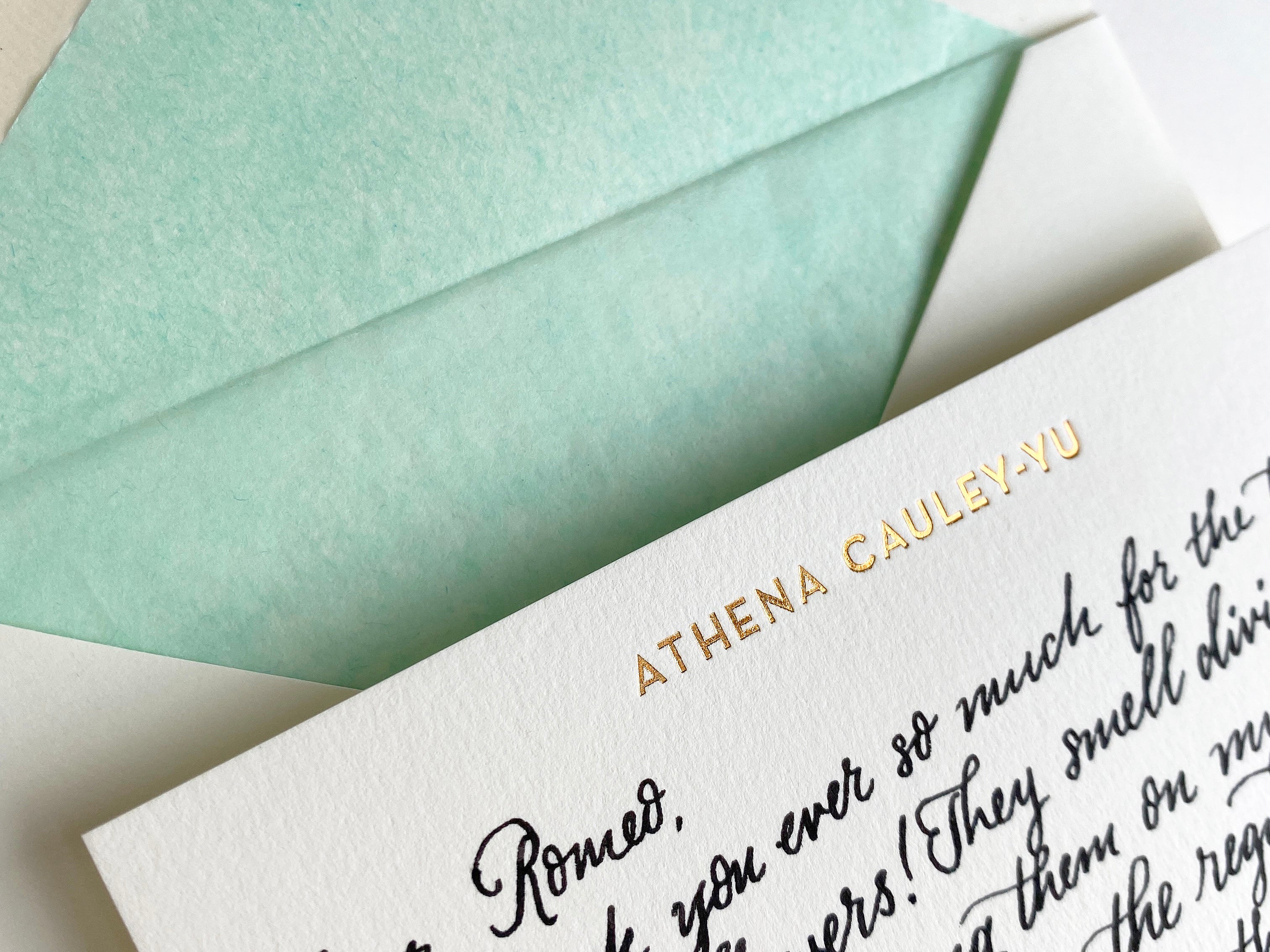 close-up of handwritten note on personalised correspondence cards