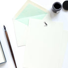 Puffin Letterpress Letterhead with light blue lined tissue and ink pot and dip pen