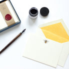 Honey Bee Letterpress Correspondence Card with yellow lined envelope and ink pot and display box