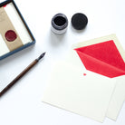 Letterpress Red Heart Correspondence Card with red tissue lined envelope and ink pot