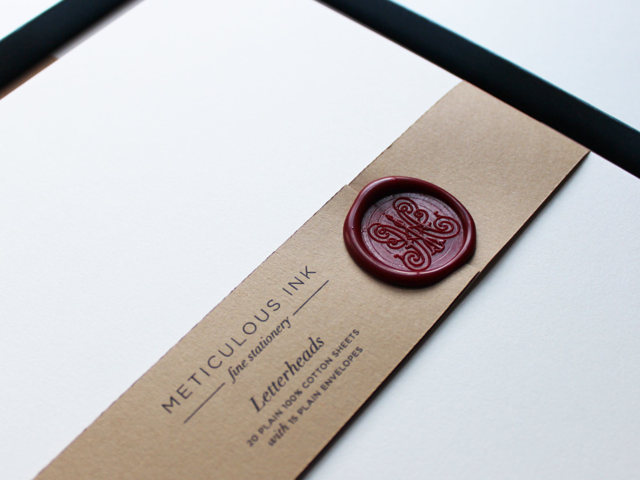 Close-up of Plain Letterhead Writing Paper in display box with wax seal