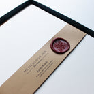 Close-up of Plain Letterhead Writing Paper in display box with wax seal