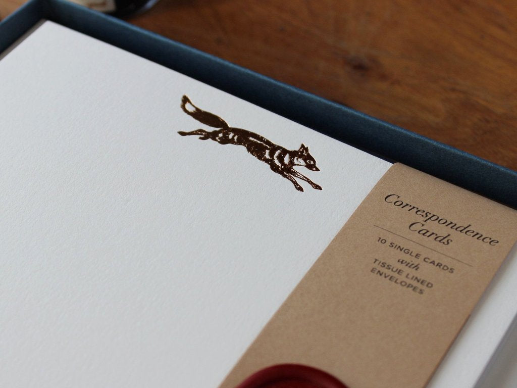 Close-up of Copper Foil Fox Correspondence Cards in display box with wax seal