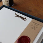 Close-up of Copper Foil Fox Correspondence Cards in display box with wax seal