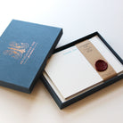 Teal Serif Thank You Letterpress Correspondence Cards in display box with wax seal and Meticulous Ink logo on box