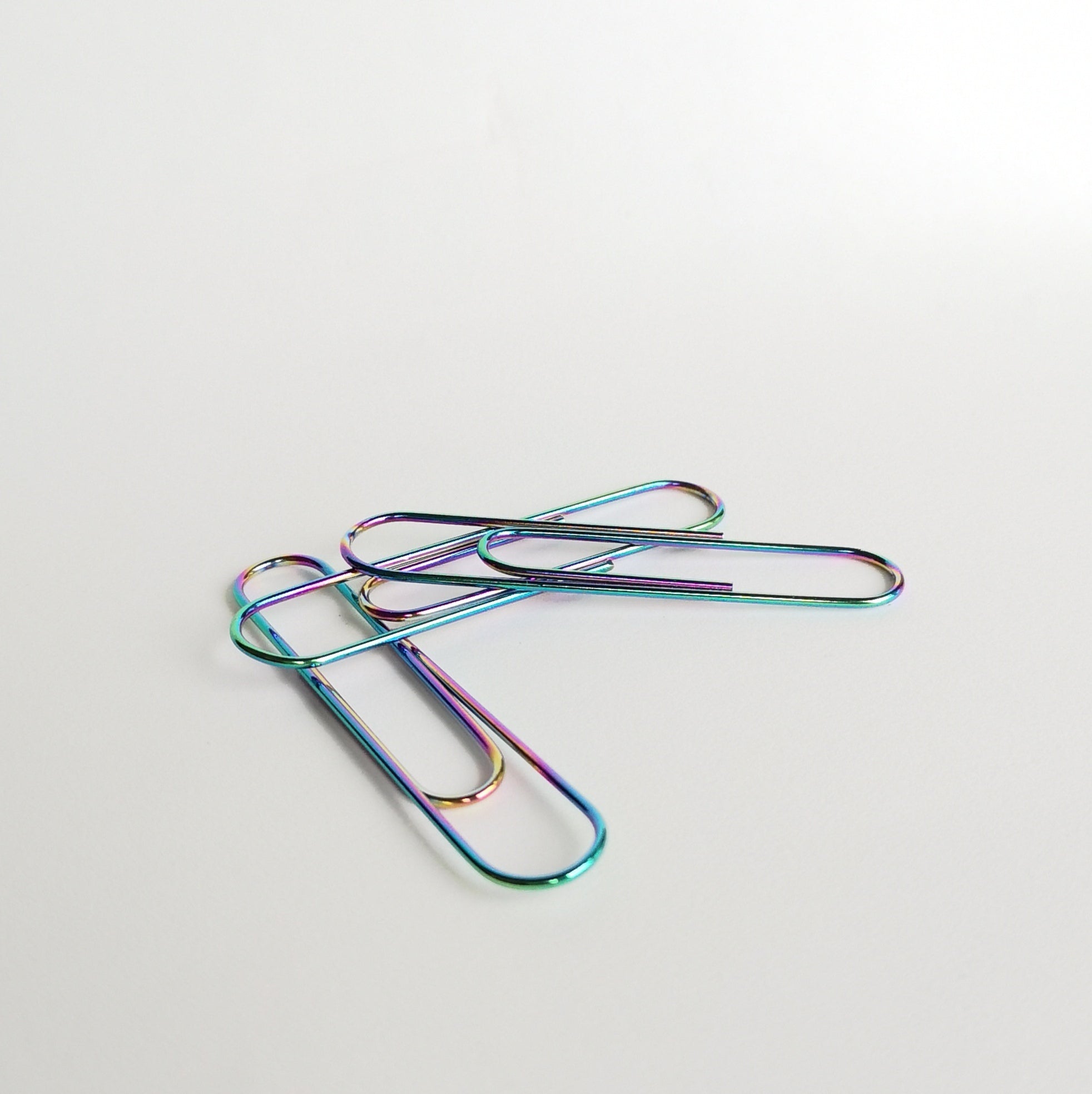 Giant metallic rainbow paperclips