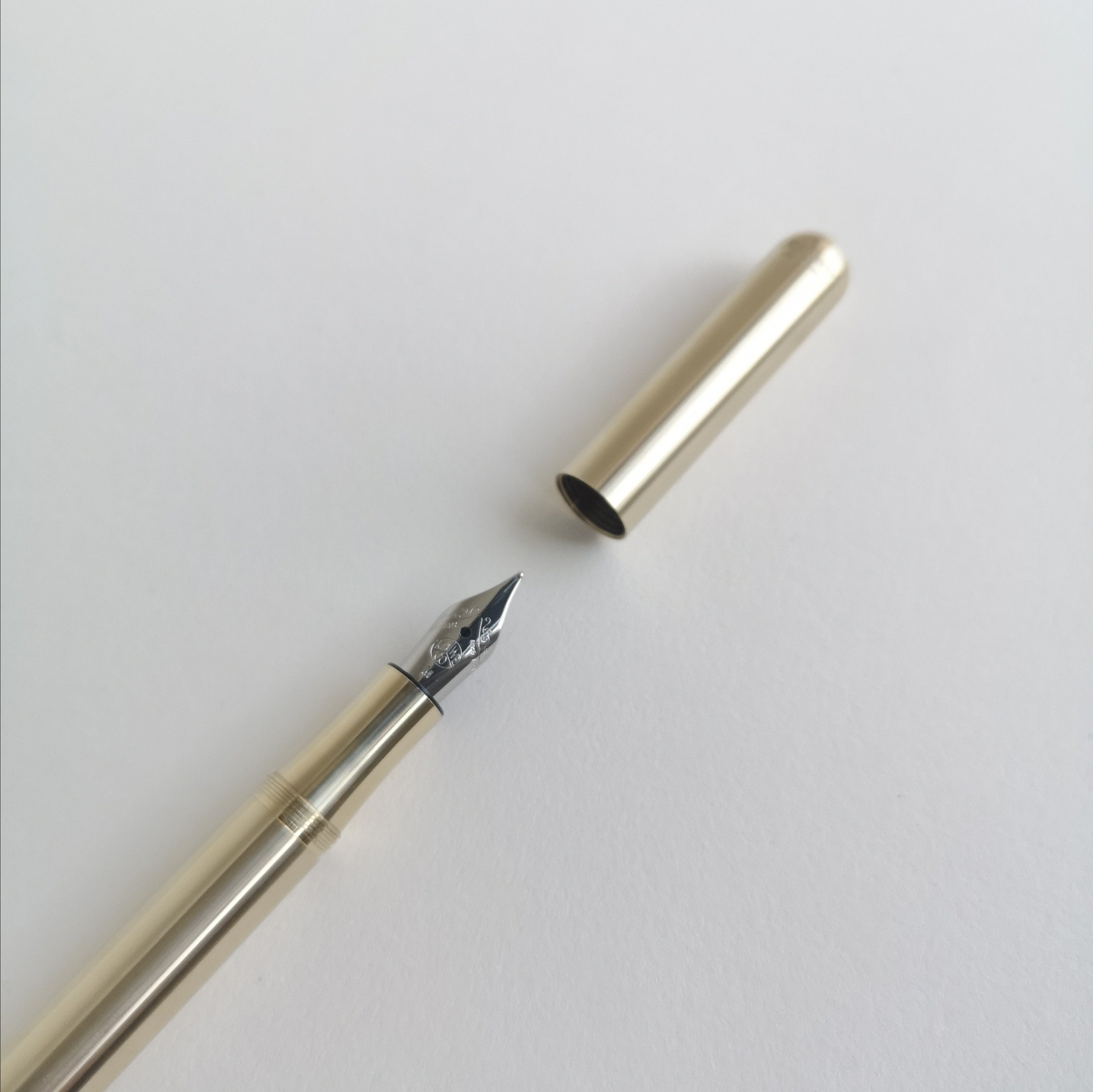 Kaweco Brass Liliput Fountain Pen close-up of nib and cap