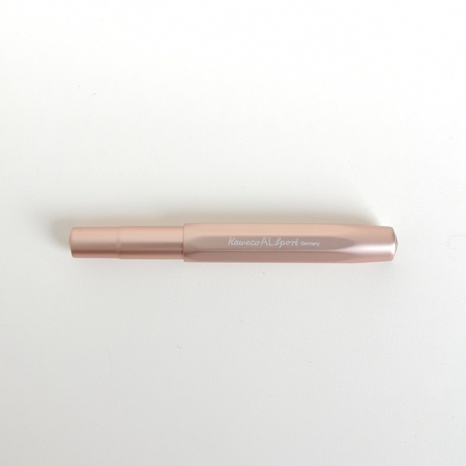 Kaweco Rose Gold Aluminium Fountain Pen with cap on