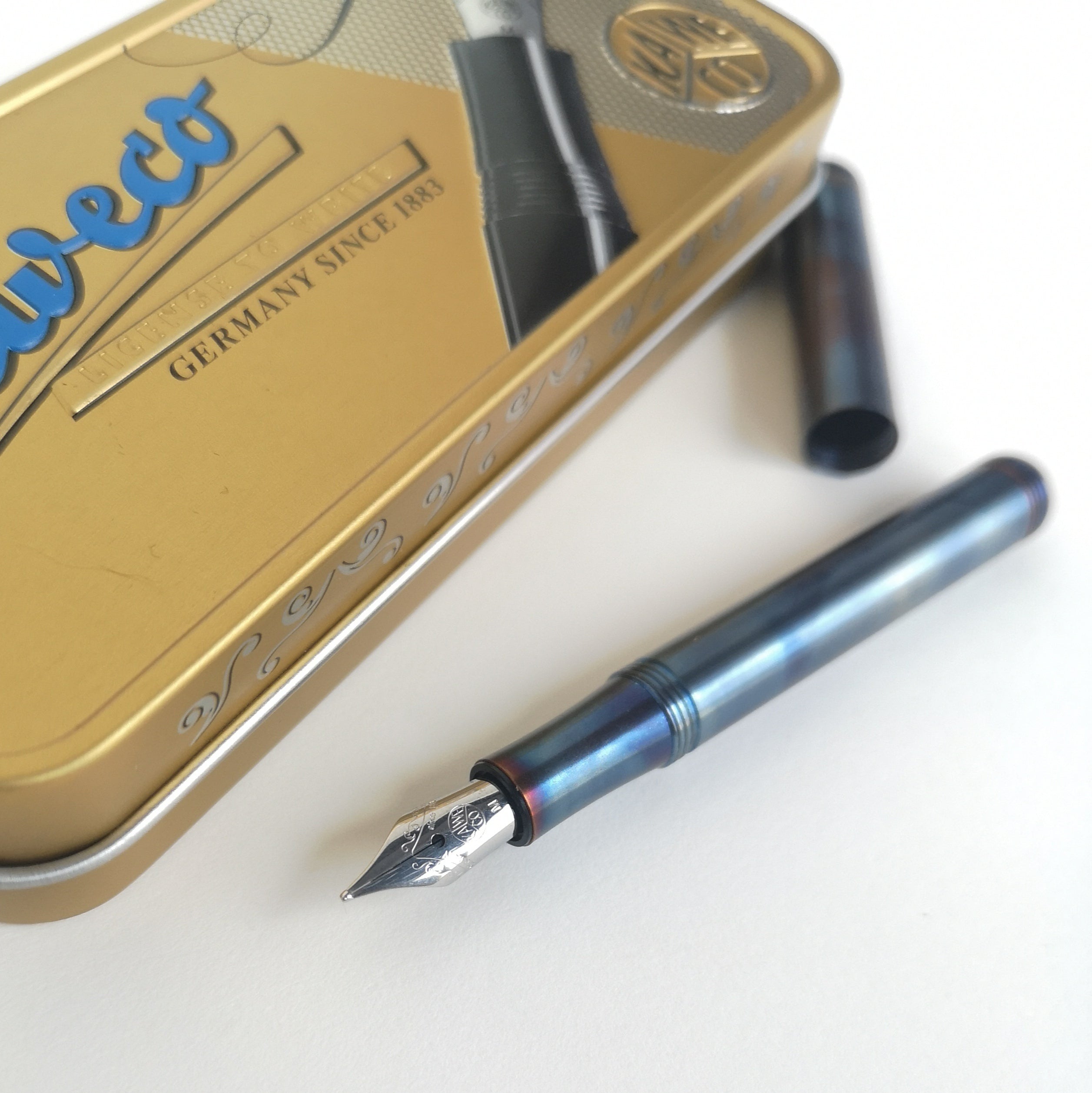 Kaweco fireblue fountain pen with metal display tin