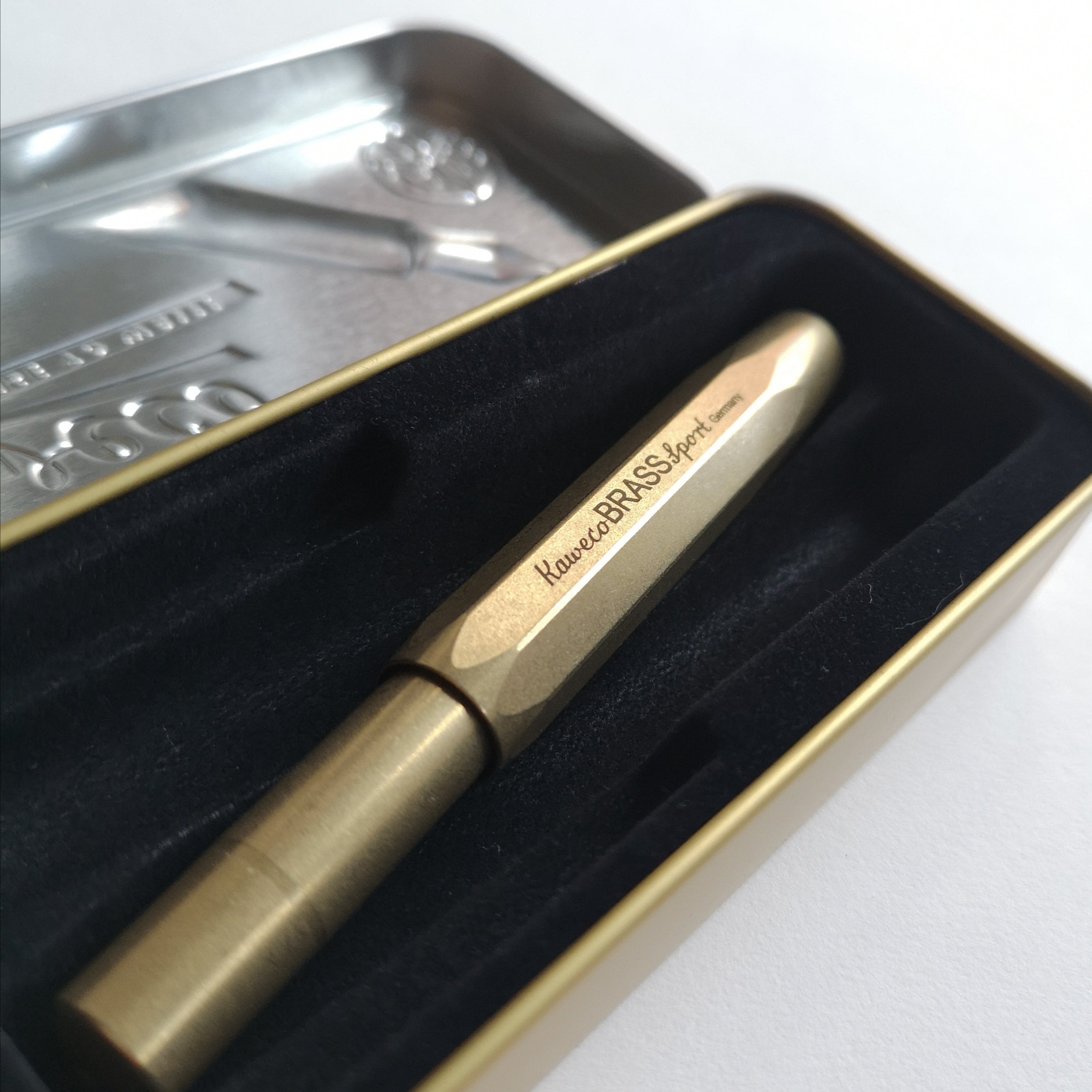 kaweco brass sport fountain pen in metal tin close-up