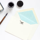 Blackbird Letterpress Correspondence Card with sky blue tissue lined envelope and ink pot