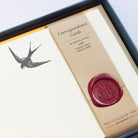 Close-up of Swallow Letterpress Correspondence Cards in display box with wax seal