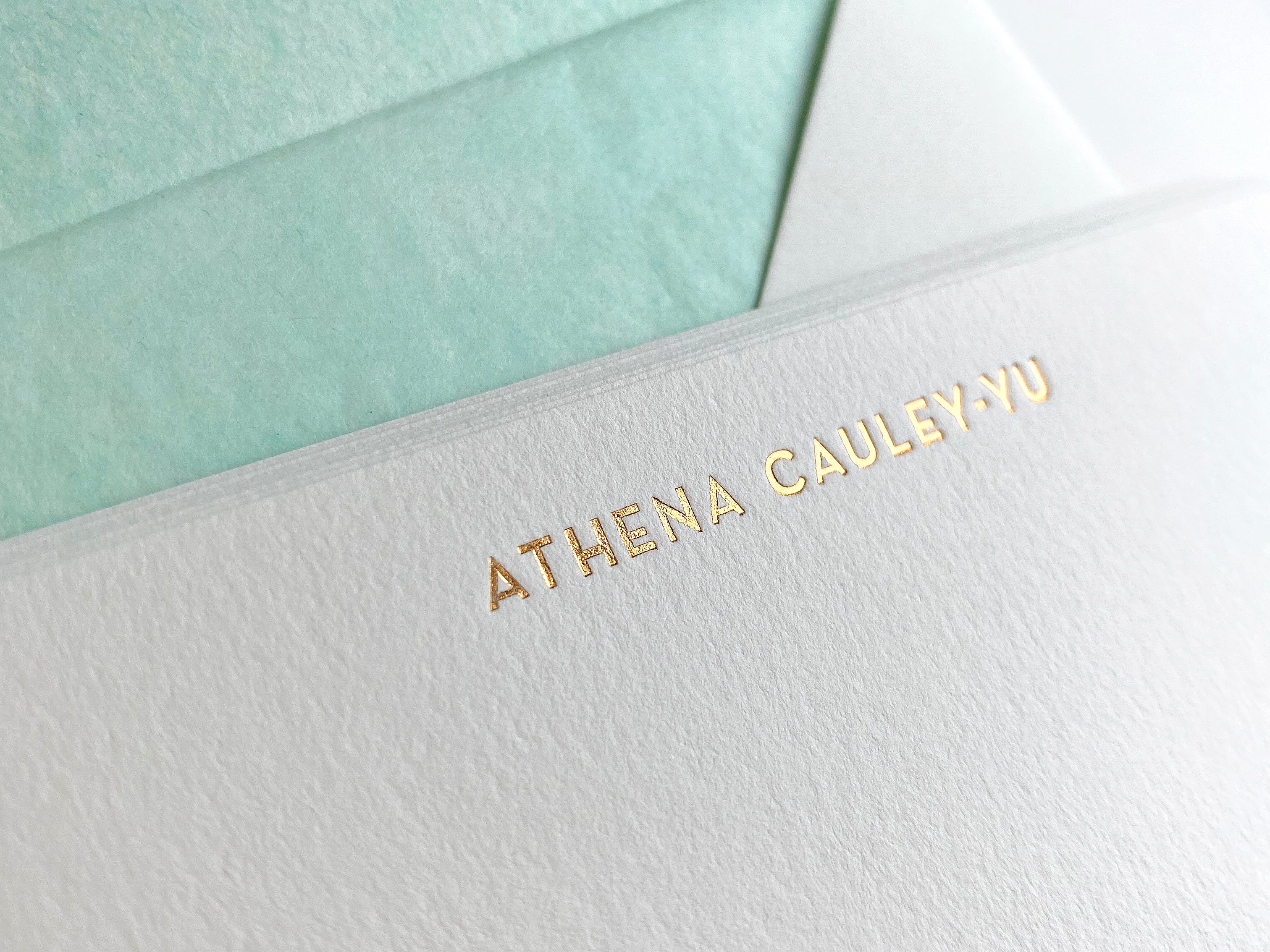 close up of shiny foil on personalised correspondence cards