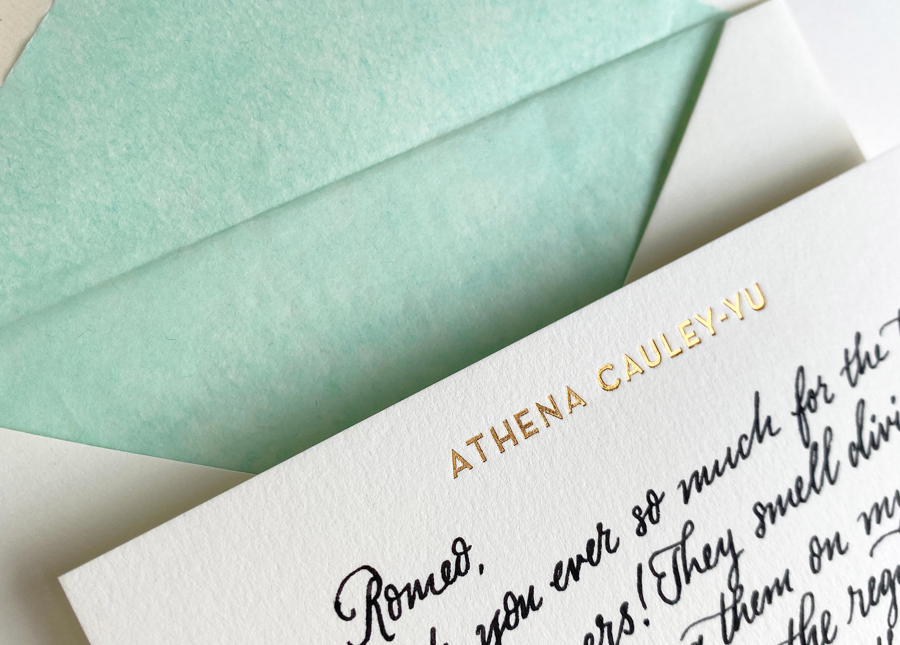 close-up of handwritten note on personalised correspondence cards