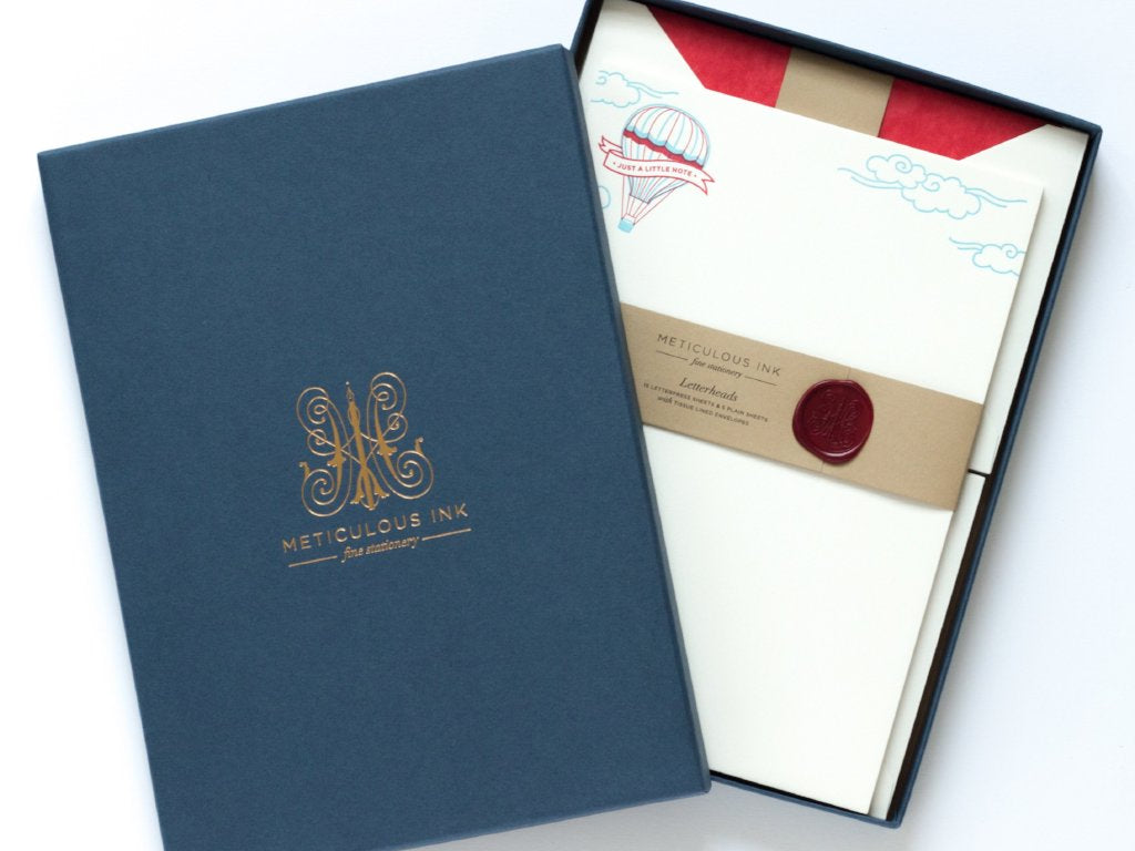 Hot Air Balloon Letterpress Letterheads in display box with wax seal and lid with Meticulous Ink logo in gold