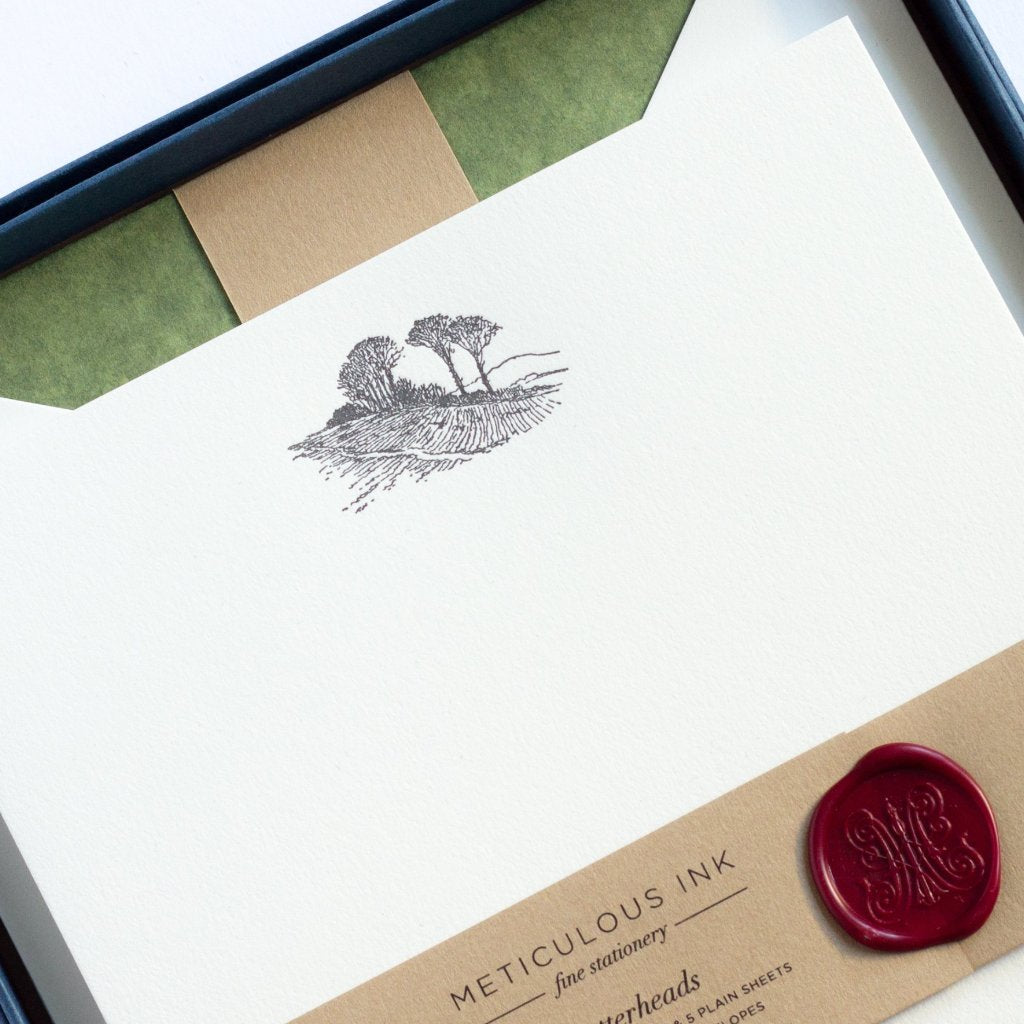 close-up of Landscape Letterpress Letterheads in display box with wax seal