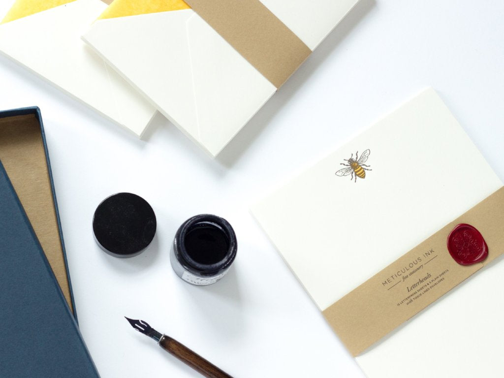 Honey Bee Letterpress Letterheads wrapped with wax seal and envelopes to one side