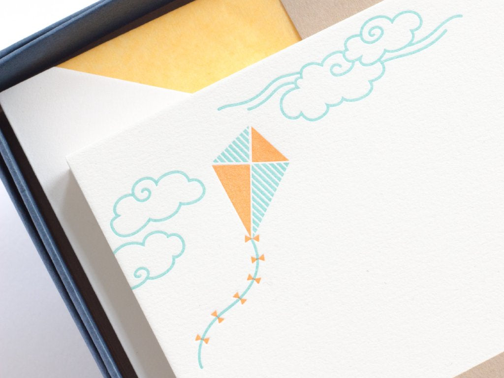 close-up of letterpress blue and orange kite 