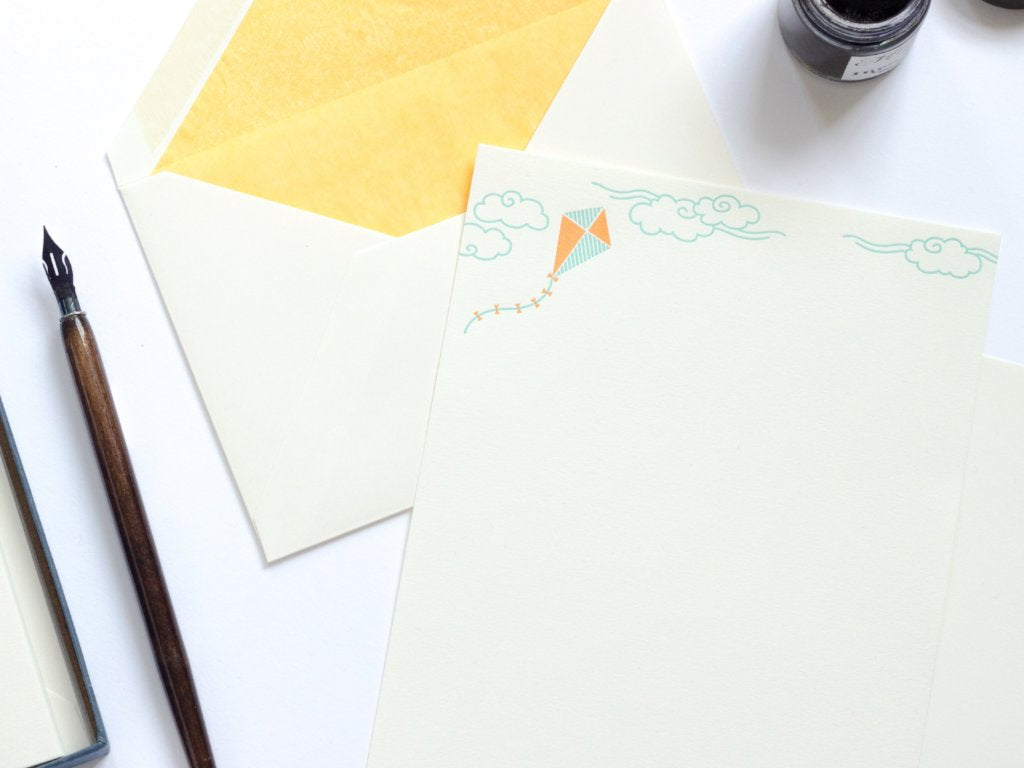 Kite Letterpress Letterhead with yellow lined enveloped and ink pot
