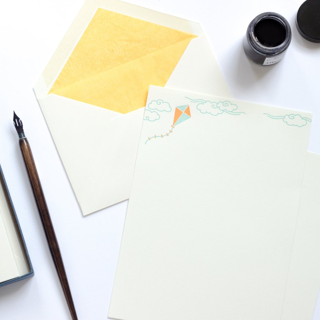 Kite Letterpress Letterhead with yellow lined enveloped and ink pot