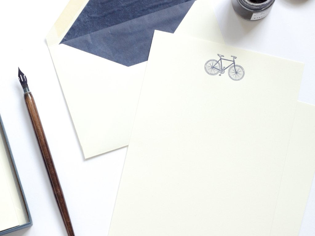 Bicycle Letterpress Letterheads with blue tissue lined envelope and ink pot