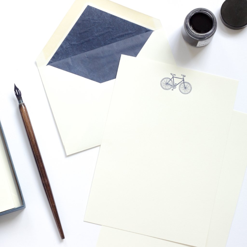 Bicycle Letterpress Letterheads with blue tissue lined envelope and ink pot