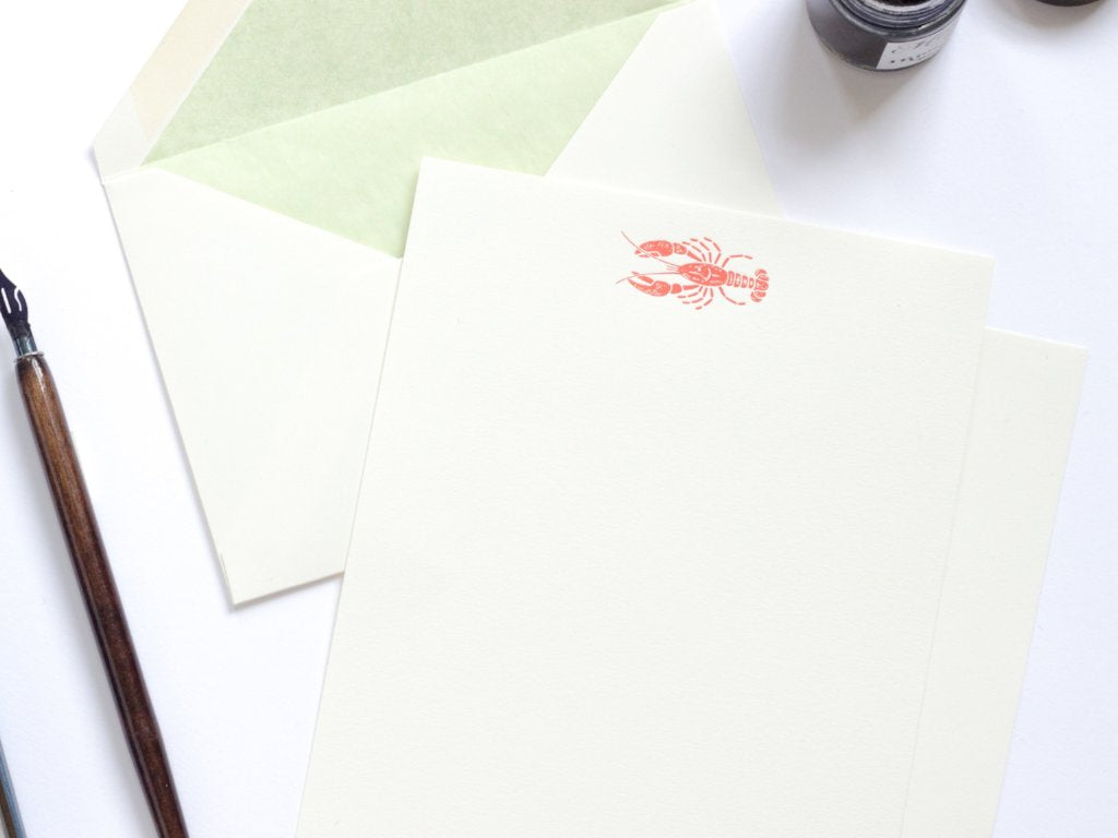Lobster Letterpress Letterhead with green tissue lined envelope and ink pot 