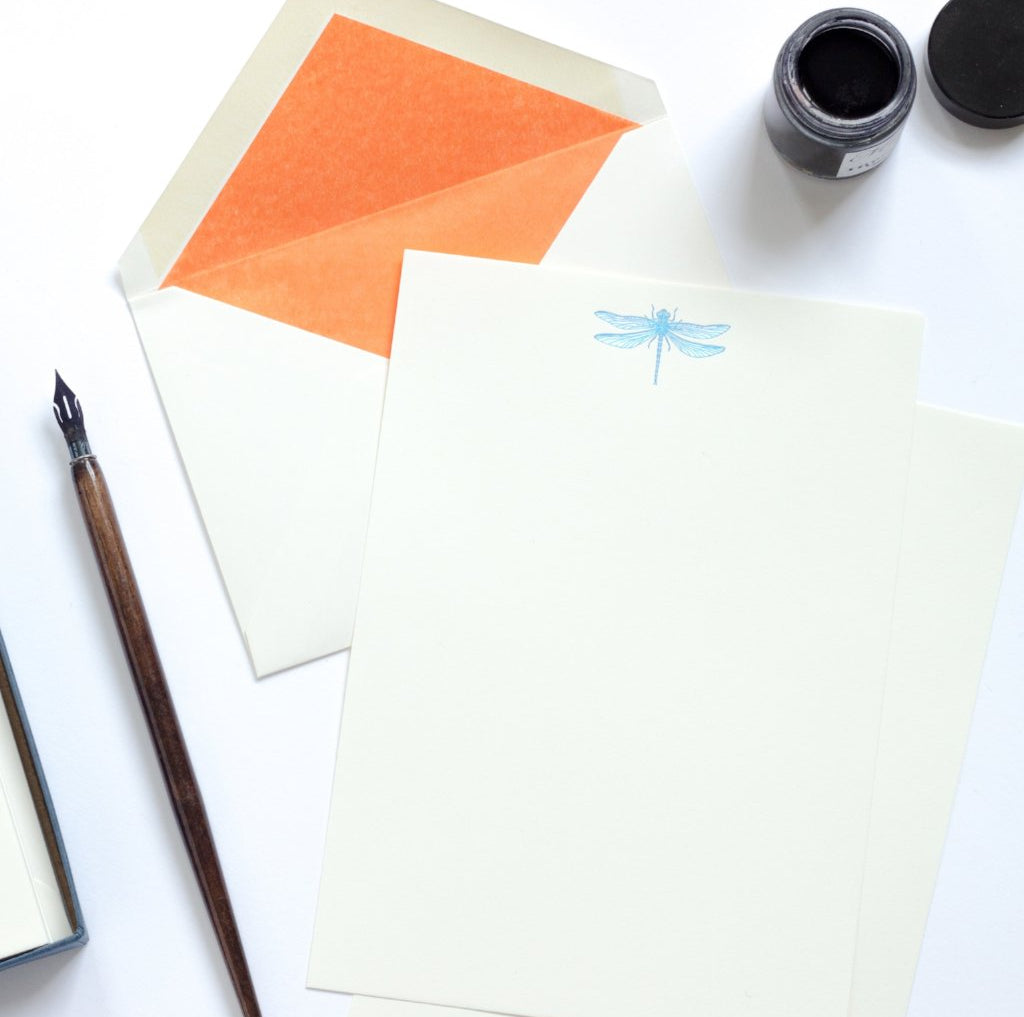 Dragonfly Letterpress Letterheads with orange lined envelope and nib and ink pot