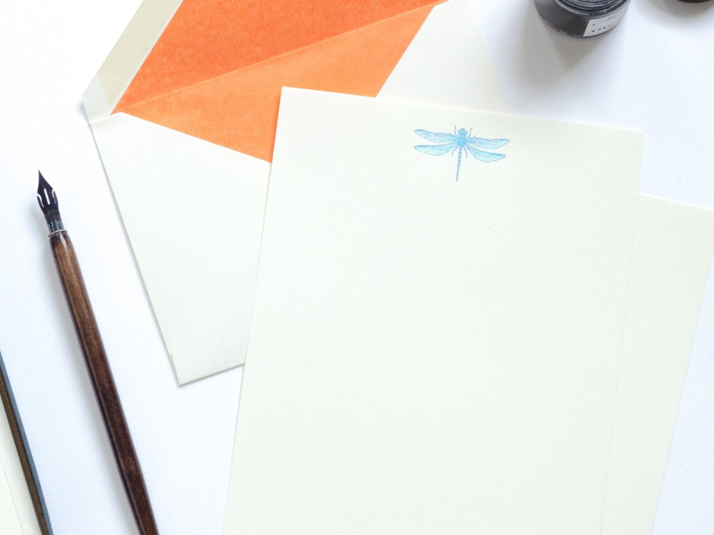 Dragonfly Letterpress Letterheads with orange lined envelope and nib and ink pot