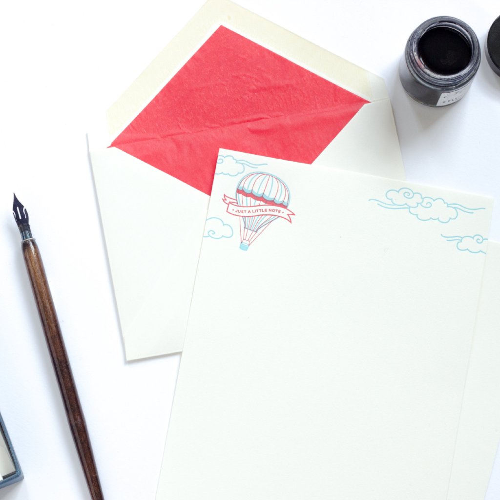 Hot Air Balloon Letterpress Letterhead with red lined envelope and ink pot and dip pen by side