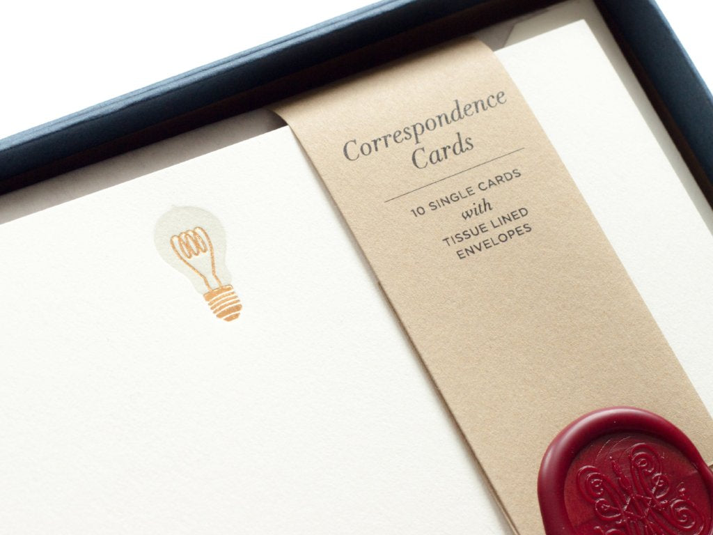 Lightbulb Letterpress Correspondence Cards close-up in display box with wax seal