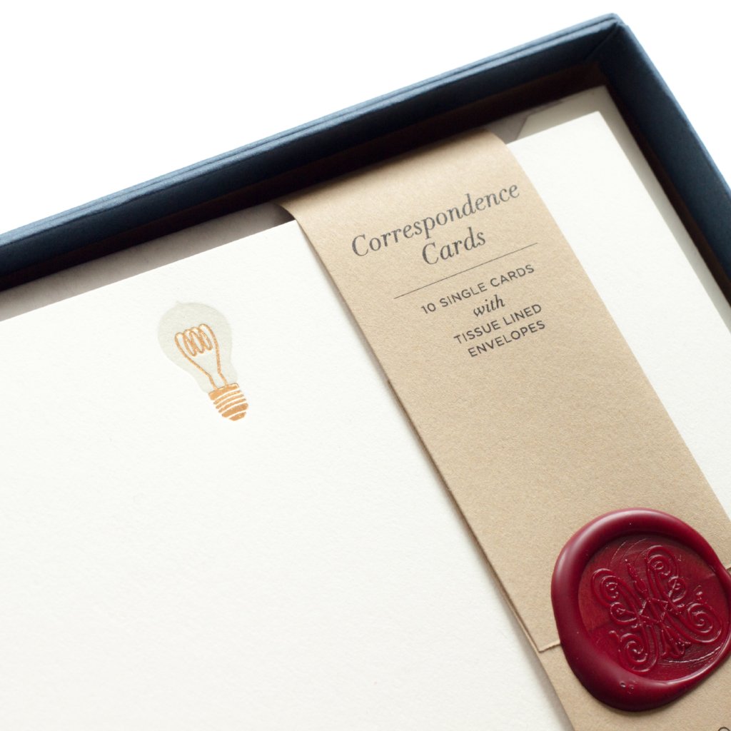 Lightbulb Letterpress Correspondence Cards close-up in display box with wax seal