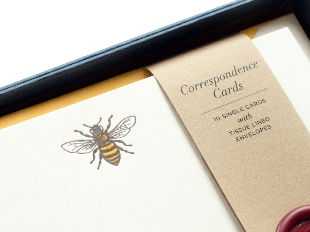 close-up of Honey Bee Letterpress Correspondence Cards in display box with wax seal