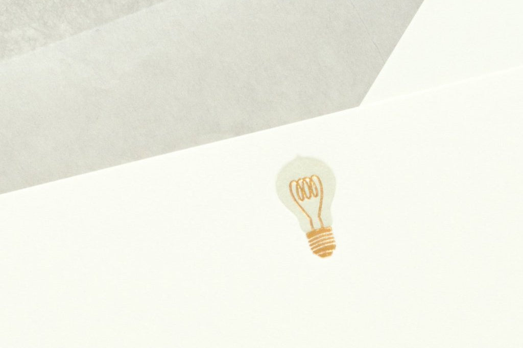 Close-up of Lightbulb Letterpress Correspondence Cards