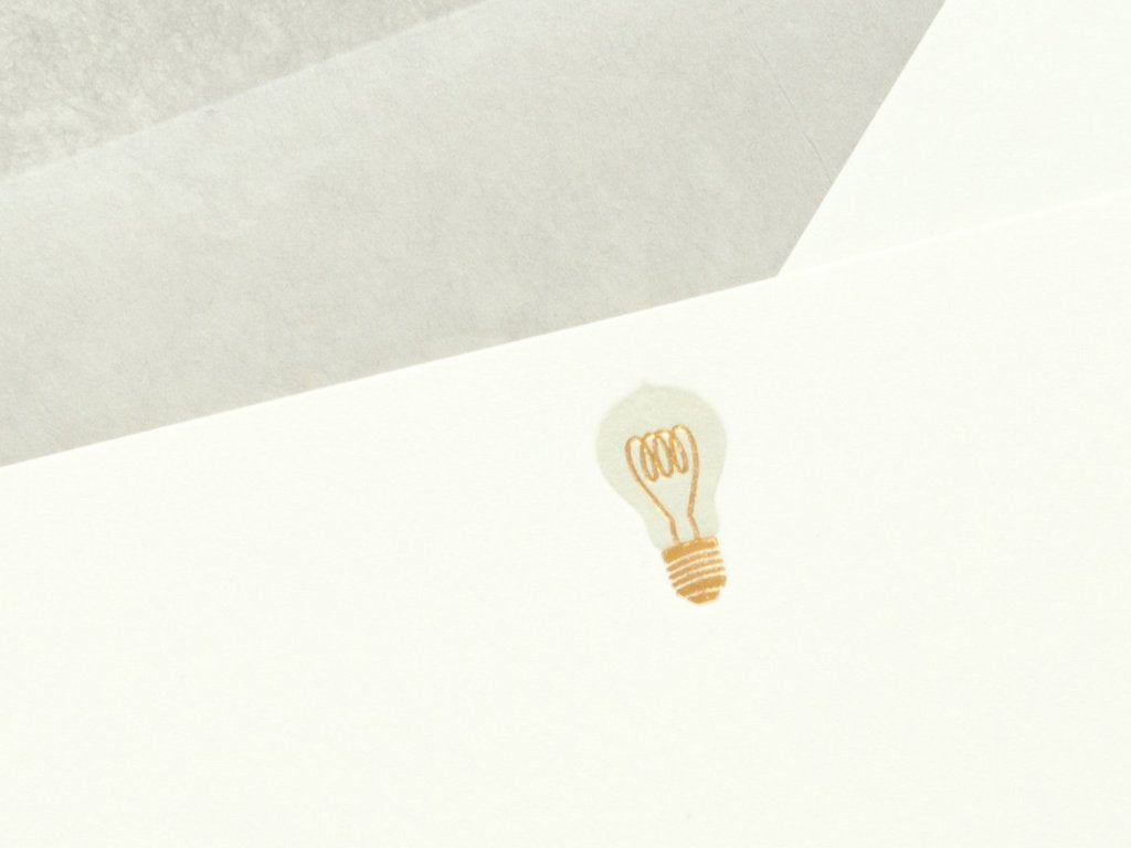 Close-up of Lightbulb Letterpress Correspondence Cards