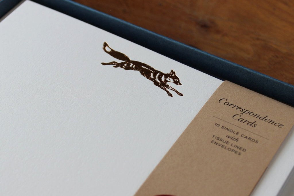 Close-up of Copper Foil Fox Correspondence Cards in display box with wax seal
