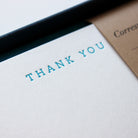 Teal Serif Thank You Letterpress Correspondence Cards in display box with wax seal