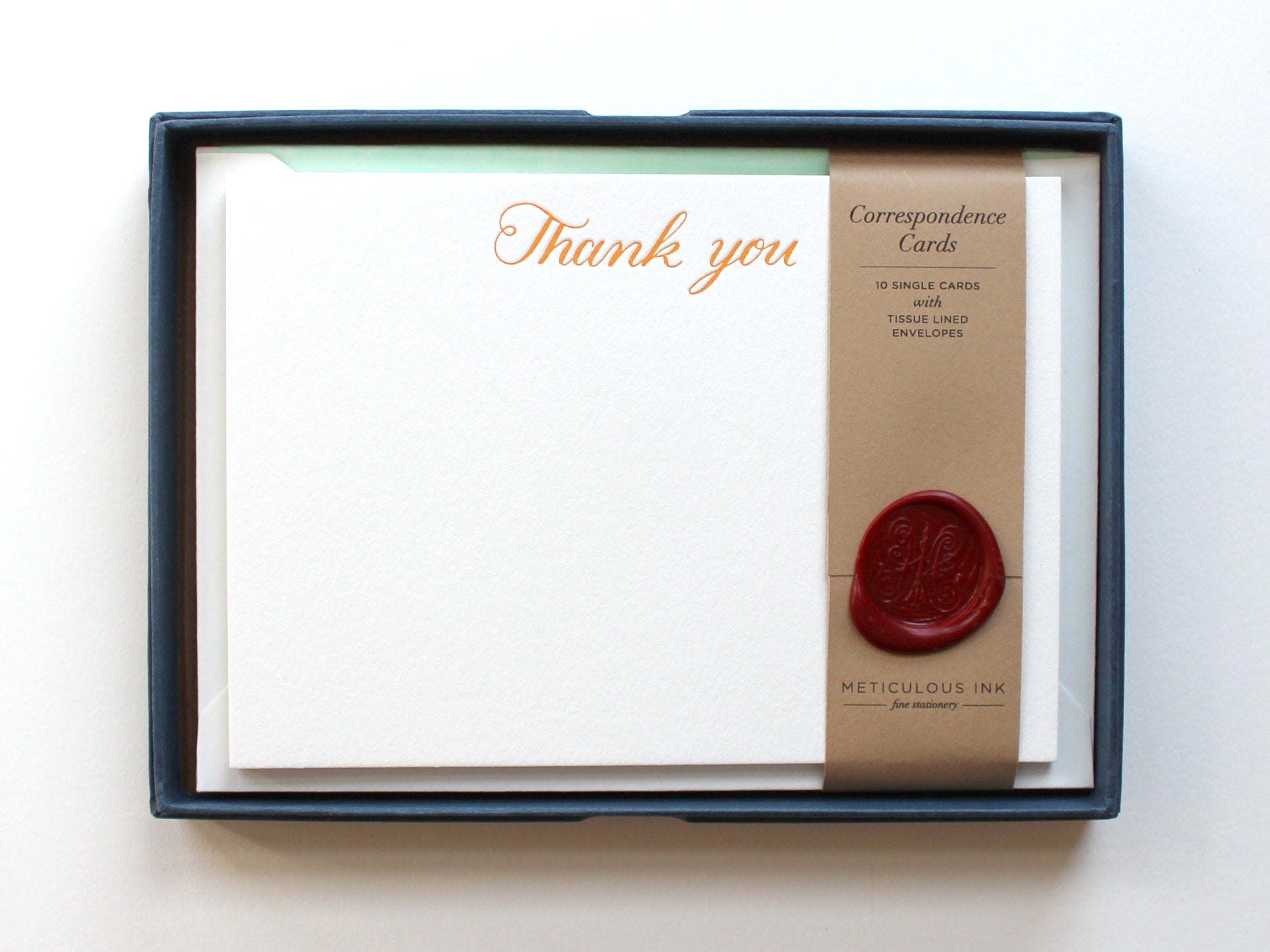 Orange Script Thank You Letterpress Correspondence Cards in display box with wax seal