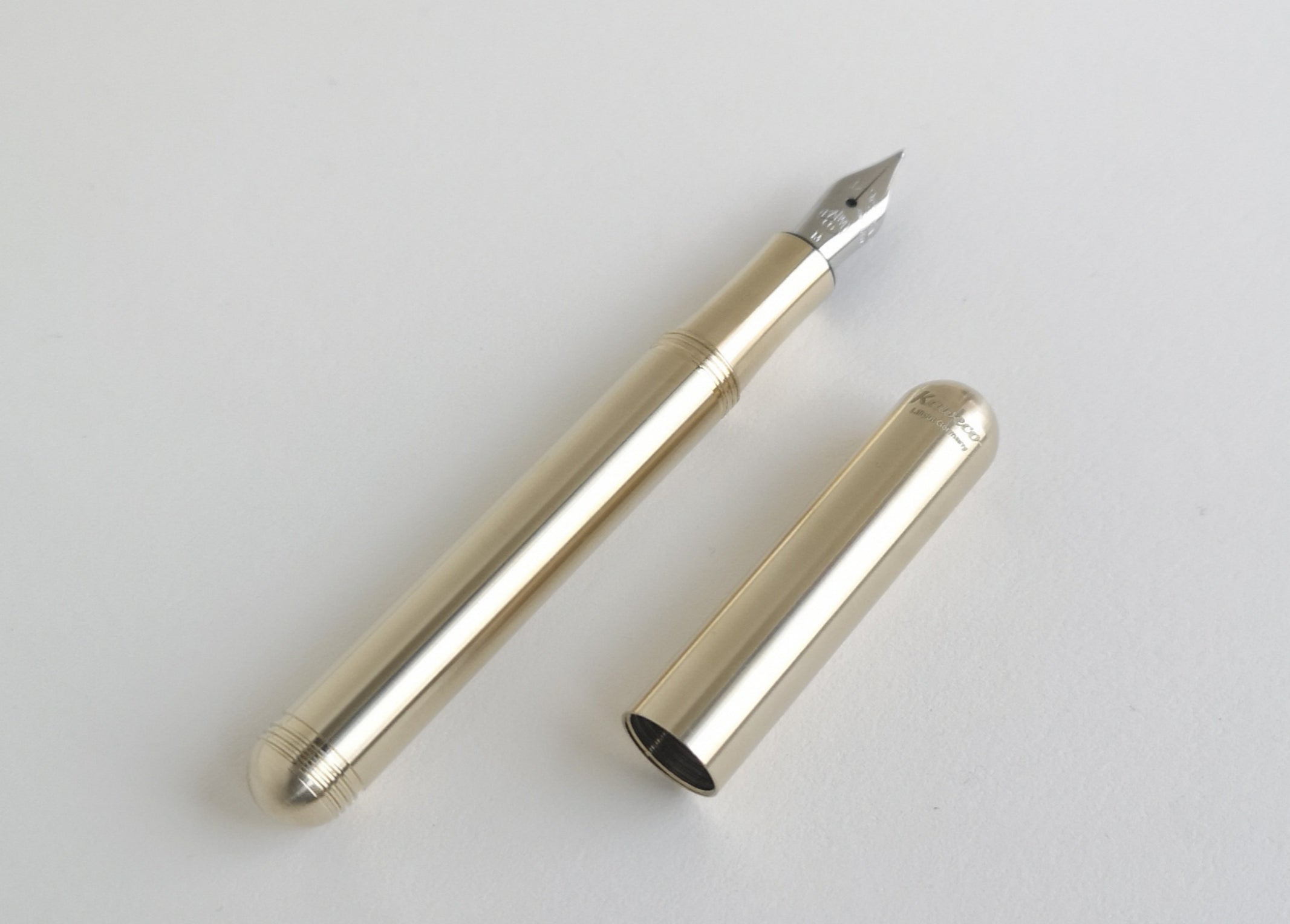 Kaweco Brass Liliput Fountain Pen with cap by side
