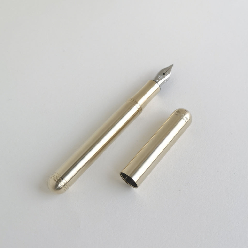Kaweco Brass Liliput Fountain Pen with cap by side