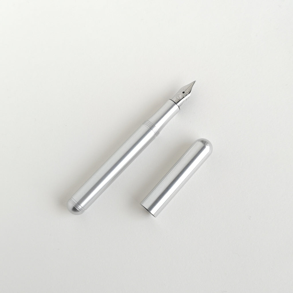 Kaweco Silver Liliput Fountain Pen with cap by side