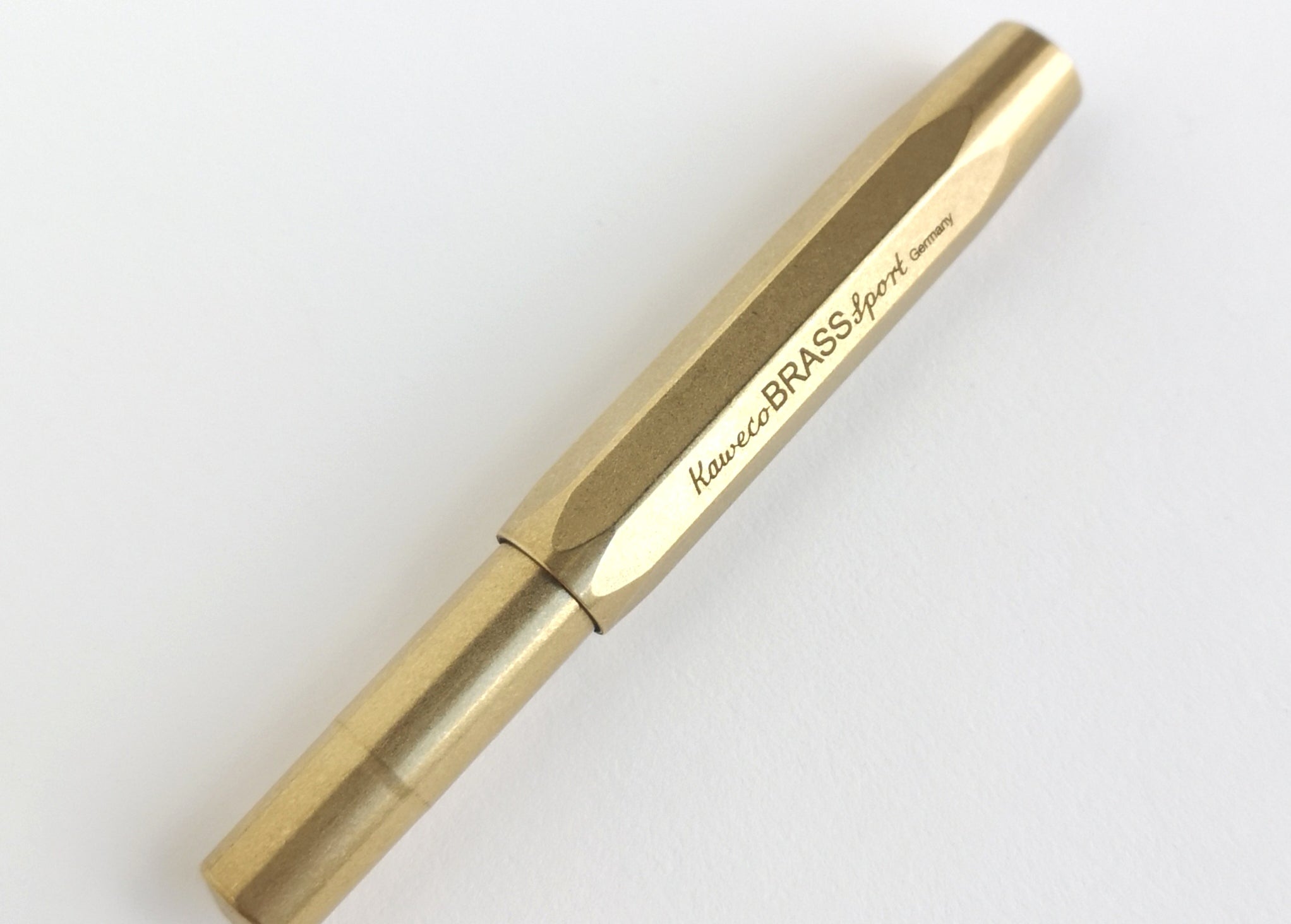 Brass Kaweco Sport Fountain pen with cap on