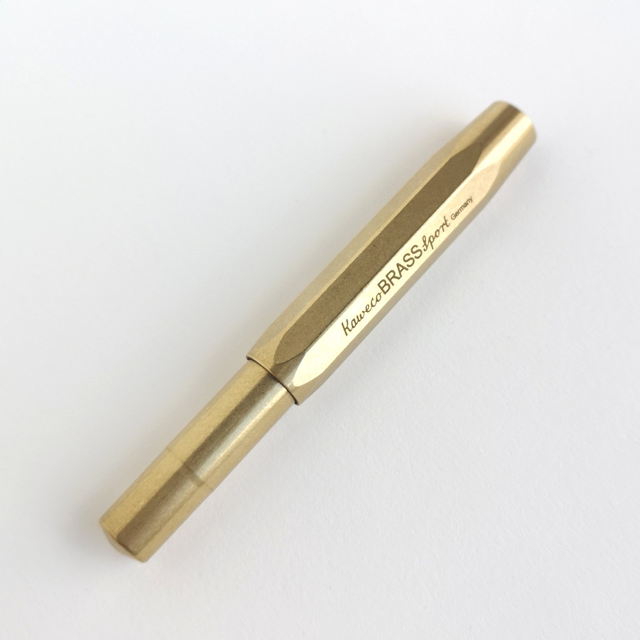 Brass Kaweco Sport Fountain pen with cap on