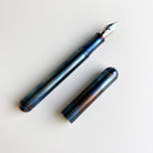 Kaweco liliput fireblue fountain pen with cap on the side
