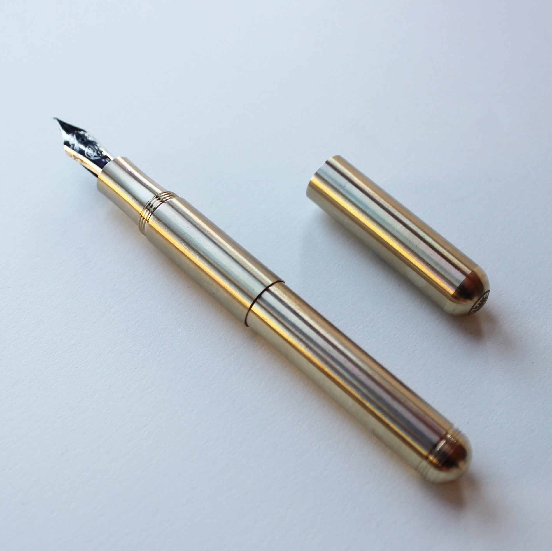 Kaweco Brass Supra Fountain Pen with cap by side