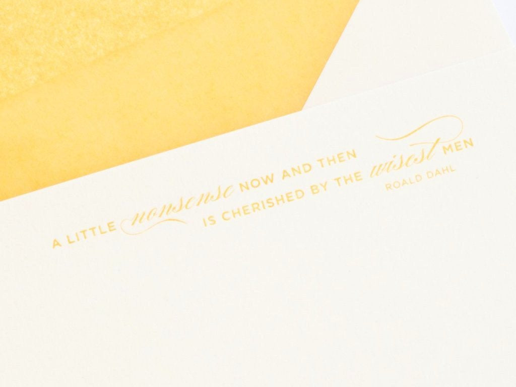 Close-up of yellow quote A little nonesense now and then is cherished by the wisest men by Roald Dahl