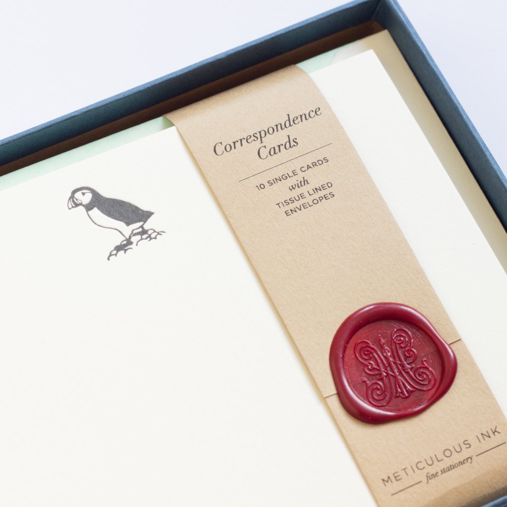 Close-up Puffin Letterpress Correspondence Cards in display box with wax seal