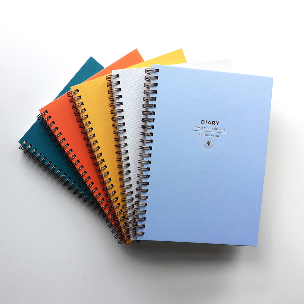 Fan selection of diaries in rainbow colours